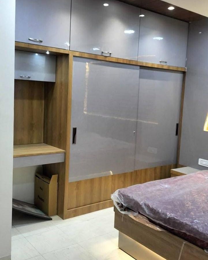 Bedroom with a fitted sliding wardrobe in Jayanagar
