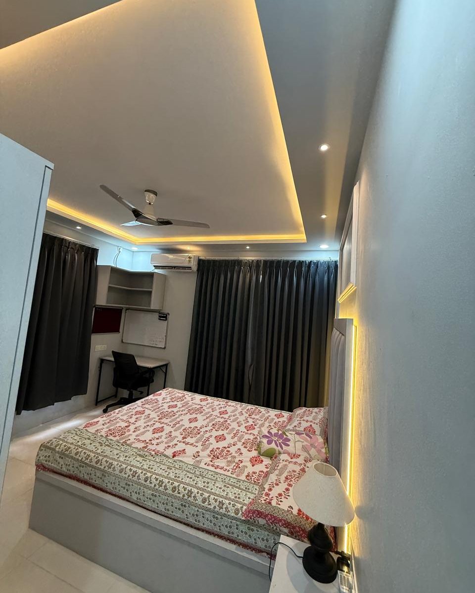 Bedroom with a cove lit false ceiling in Hebbal
