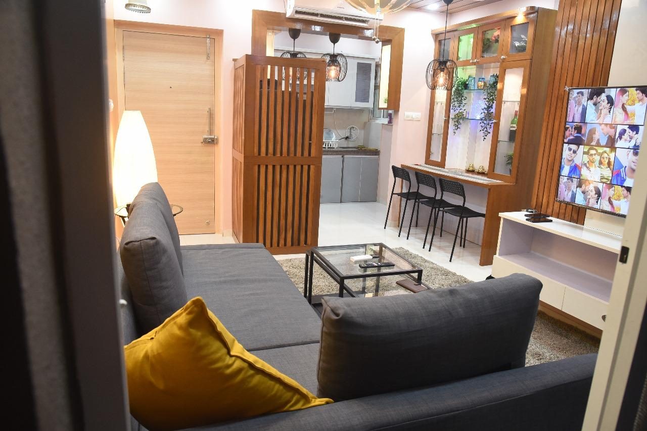 Living room opening to a breakfast counter in Hebbal