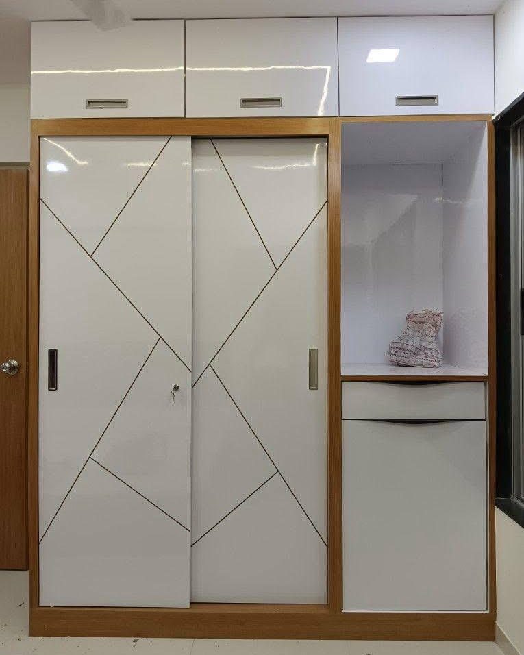 Sliding wardrobe with panelled doors in HSR Layout